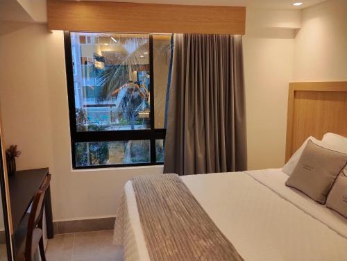 Postel nebo postele na pokoji v ubytování Apto 203 Legacy Suítes