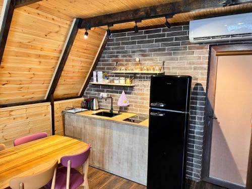 Kuchyň nebo kuchyňský kout v ubytování Cottage Kedkedi Machakhela