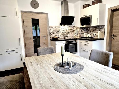 Kuchyň nebo kuchyňský kout v ubytování Apartments Fasl