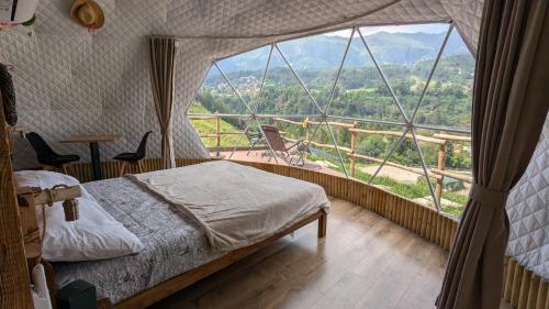 Postel nebo postele na pokoji v ubytování EdenCamp glamping