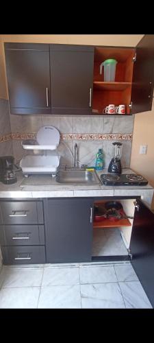 Küche/Küchenzeile in der Unterkunft Habitación principal en Mazatlán