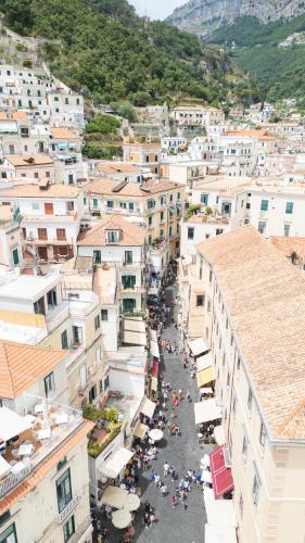 an aerial view of a city with buildings at Residenza Luce in Amalfi