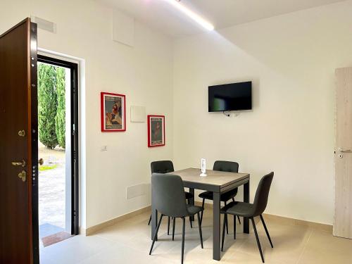 TV a/nebo společenská místnost v ubytování Il Vigneto Suite