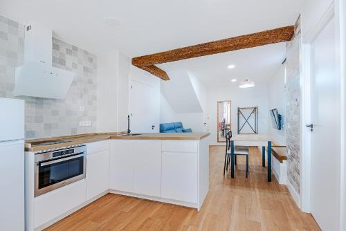 Η κουζίνα ή μικρή κουζίνα στο Encantos del Jerte Apartamentos