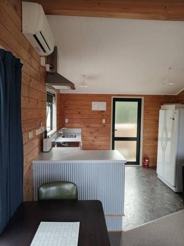 Kuchyň nebo kuchyňský kout v ubytování Manapouri Beech Haven