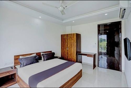Hotel Pomona Inn by Pulo Hotelsにあるベッド