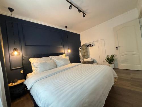 Ένα ή περισσότερα κρεβάτια σε δωμάτιο στο Otilia Home