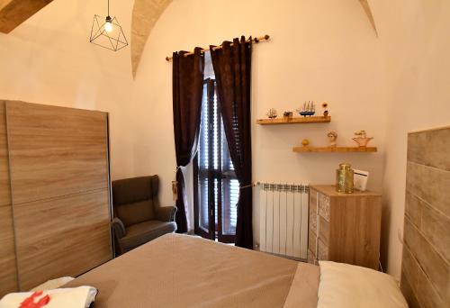 Postel nebo postele na pokoji v ubytování Dimora Kettino Terrace