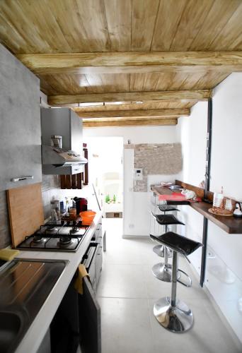 Kuchyň nebo kuchyňský kout v ubytování Dimora Kettino Terrace