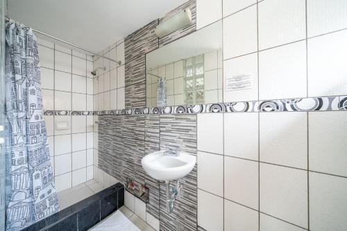 Ванная комната в Imperial Inn Hospedaje Turistico