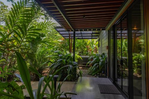 an external view of a house with plants at Noah's Forest Hotel by Tifakara in Fortuna
