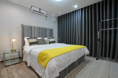 En eller flere senge i et værelse på Josden Apartments T1