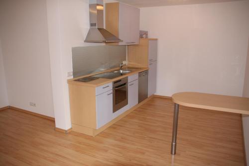 Η κουζίνα ή μικρή κουζίνα στο Ferienwohnung an den Weinbergen