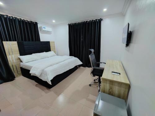 Postel nebo postele na pokoji v ubytování Lekki City View Apartment