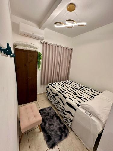 Ένα ή περισσότερα κρεβάτια σε δωμάτιο στο Flat em Americana SP