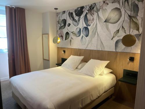 Postel nebo postele na pokoji v ubytování Hotel Les Tilleuls
