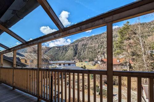 a view from the balcony of a cabin with a mountain view at A cozy little flat in Ried in Ried im Oberinntal