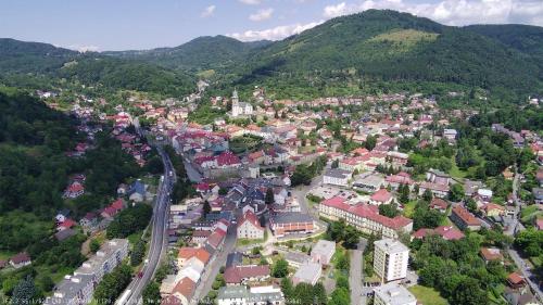 an aerial view of a town in the mountains at Privát Adriana in Kremnica