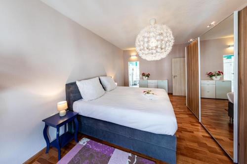 Ένα ή περισσότερα κρεβάτια σε δωμάτιο στο Premium Schwarzwald Suite