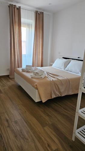 Ένα ή περισσότερα κρεβάτια σε δωμάτιο στο Nel Cuore del Borgo "Superior"