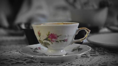 Apartament ,,Kraina Alicji''にあるコーヒーまたはお茶