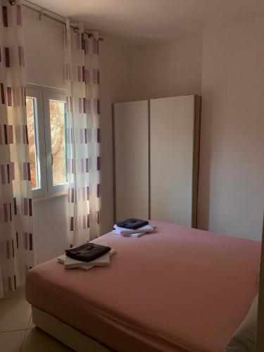 Postel nebo postele na pokoji v ubytování Manda Gradac