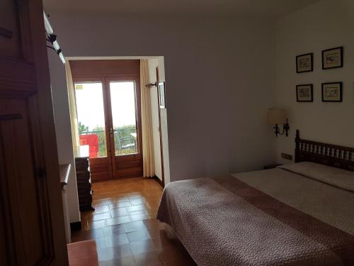 Postel nebo postele na pokoji v ubytování Hostal Sa Barraca - Adults Only