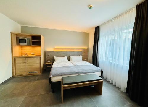 Katil atau katil-katil dalam bilik di Hotel Schwarzes Ross
