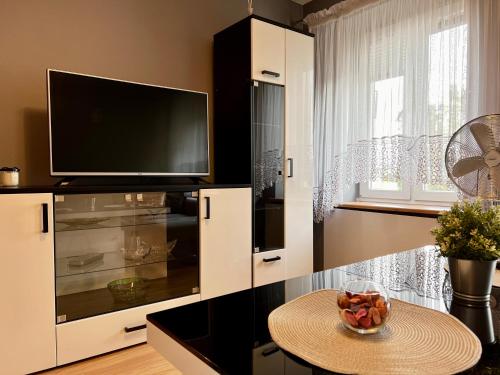 Kuchyň nebo kuchyňský kout v ubytování Mieszkanie w centrum miasta 37