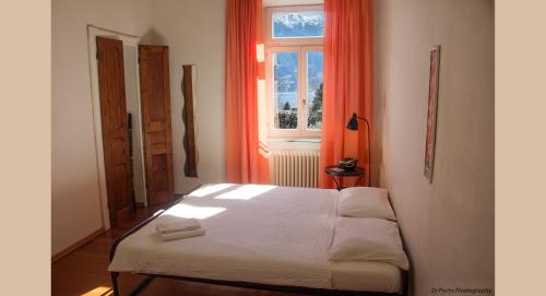 מיטה או מיטות בחדר ב-Villa Ginia