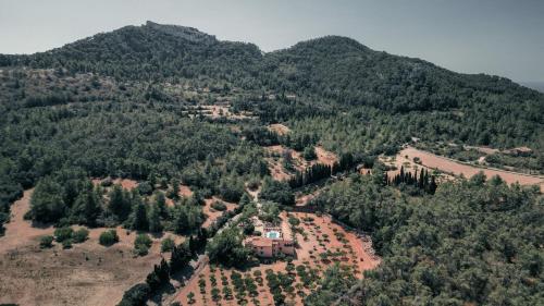 an aerial view of a house in the middle of a mountain at Villa Bell Lloc by SOMNIA in Felanitx