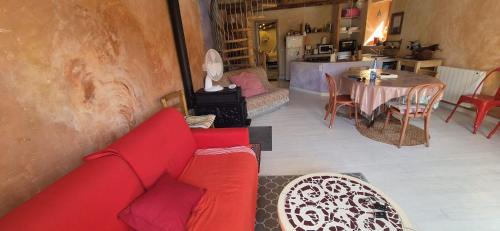 Area soggiorno di Eco-gîte panoramique face aux volcans avec ateliers couture bohème en option