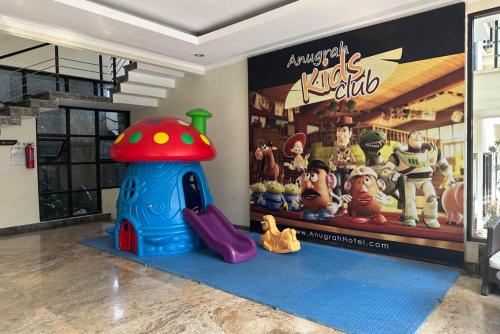 a room with a toy store with a play area at Anugrah Hotel Sukabumi in Sukabumi