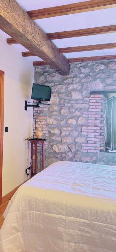 Ένα ή περισσότερα κρεβάτια σε δωμάτιο στο Casa Albertino