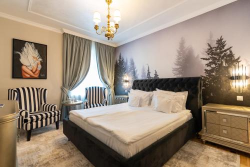 Кровать или кровати в номере Hotel Palace