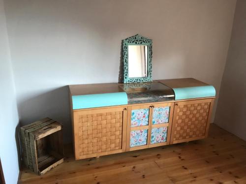 a dressing table with a mirror on top of it at Casa Milu in Armiello