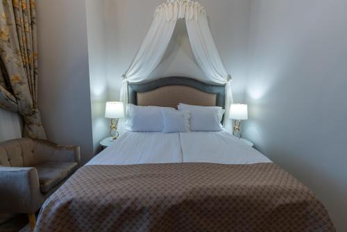 Кровать или кровати в номере Hotel Palace