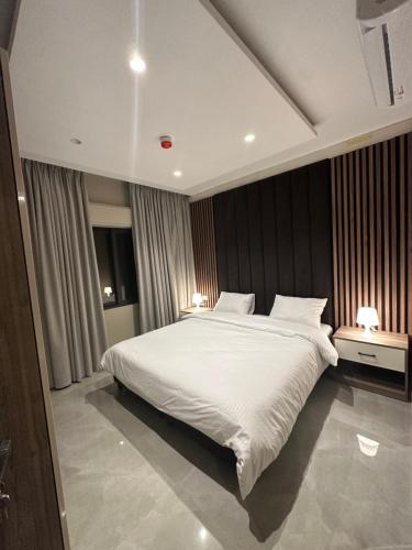 Ένα ή περισσότερα κρεβάτια σε δωμάτιο στο Chic Apartments For Rent ave1-7