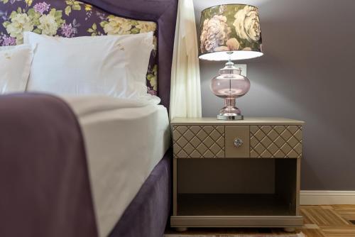 Кровать или кровати в номере Hotel Palace