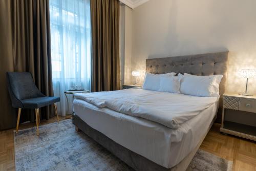 Кровать или кровати в номере Hotel Palace
