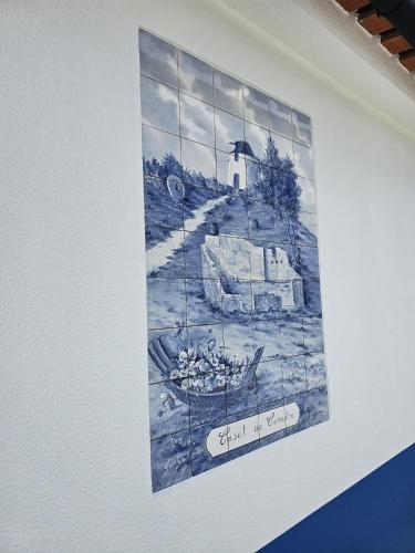 a drawing of a church on a wall at Sunflower Castle View in Óbidos in Óbidos