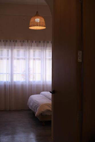 Cama o camas de una habitación en Neoli