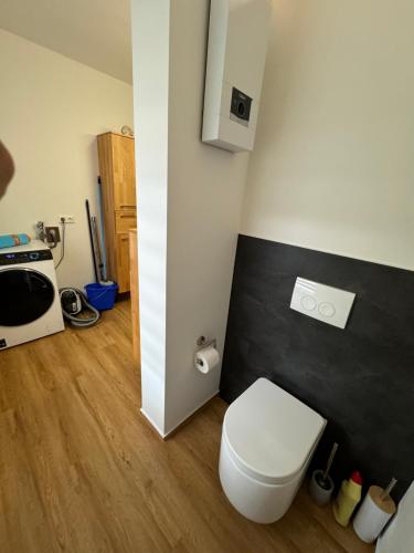 Ένα μπάνιο στο Ferienwohnung Le Petit