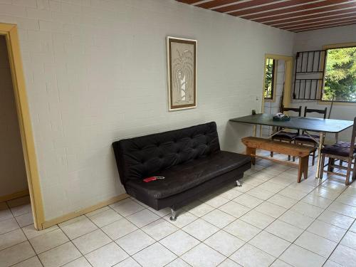 Posezení v ubytování Casa no Lago dos Encantos