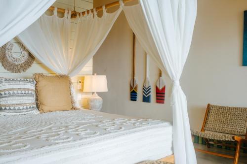 Letto o letti in una camera di Tranquilseas Eco Lodge & Dive Center