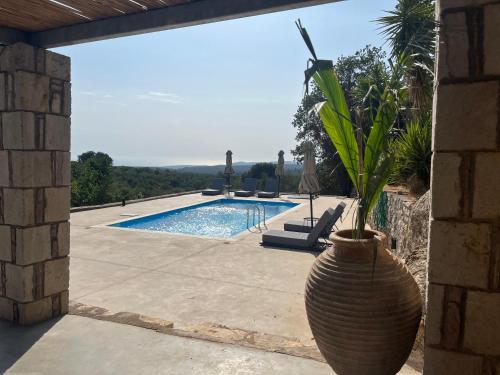 Πισίνα στο ή κοντά στο Villa Pericles
