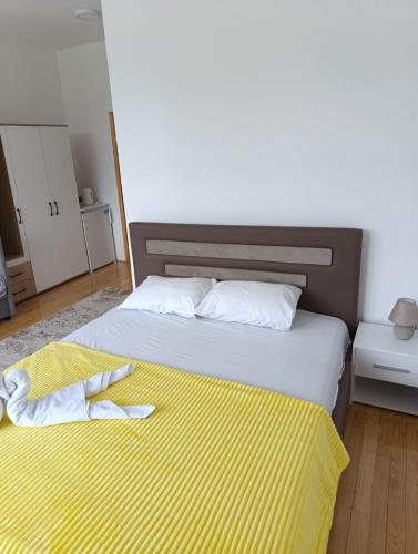 Apartmani Helenaにあるベッド