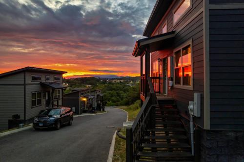 a car parked on a street next to a house at Family or couple retreat next to Downtown, Dollywood & Smoky Mountains! in Sevierville