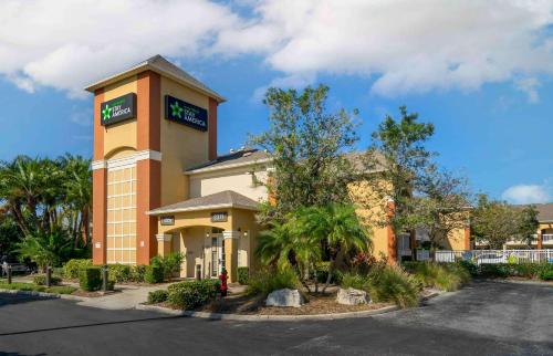 a hotel building with a fire hydrant in front of it at Extended Stay America Suites - Clearwater - Carillon Park in Clearwater