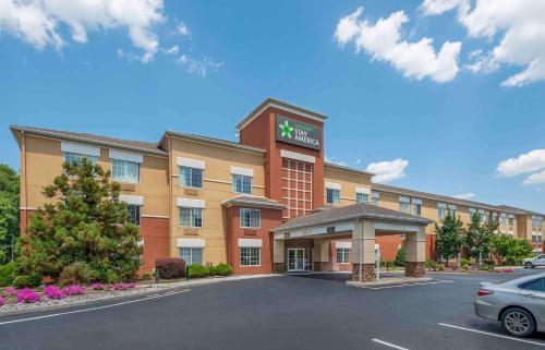 a rendering of a hotel with a parking lot at Extended Stay America Suites - Newark - Woodbridge in Woodbridge